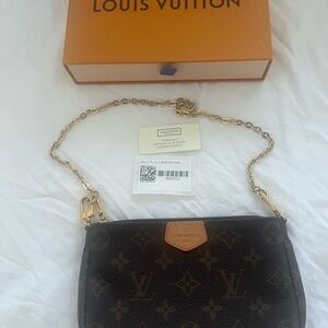 Louis Vuitton Black and Gold Monogram Clutch